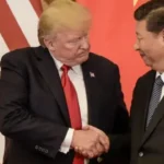 _115011192_trumpandxihandshake.jpg