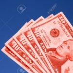 4096229-red-dollars-symbolizing-debt-it-could-be-through-a-loan-a-mortgage-or-just-simply-owing-money